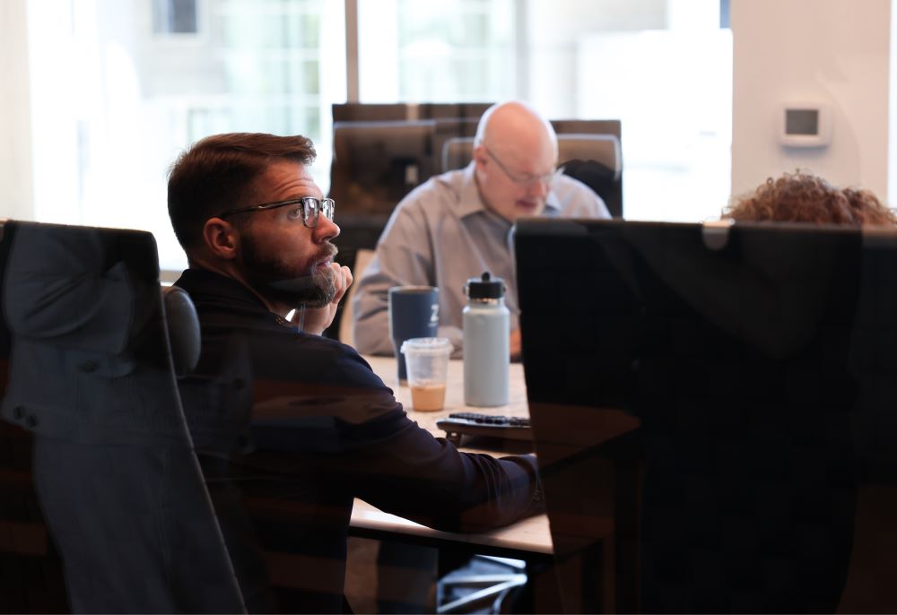 Zion & Zion team working at conference table