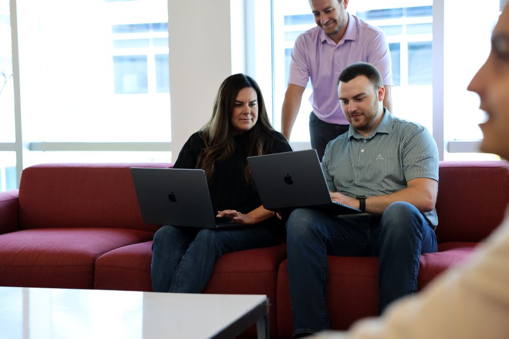 Zion & Zion team members working in office