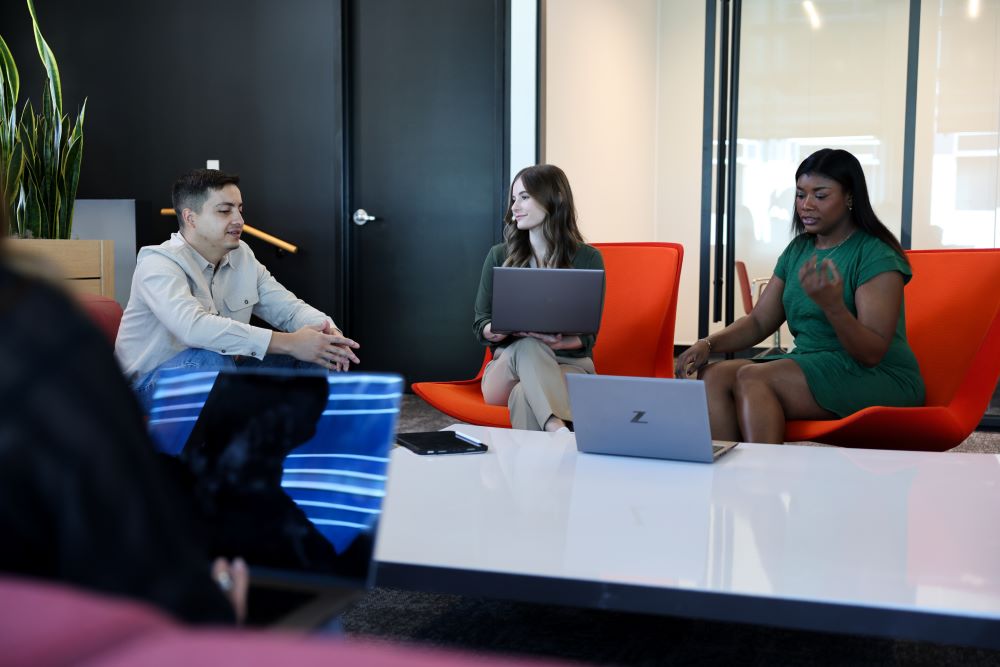 Zion & Zion employees talking and working